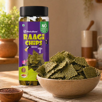Bowl of crispy ragi chips with moringa placed beside NatuRaw snack jar, high fiber healthy millet snack for weight management